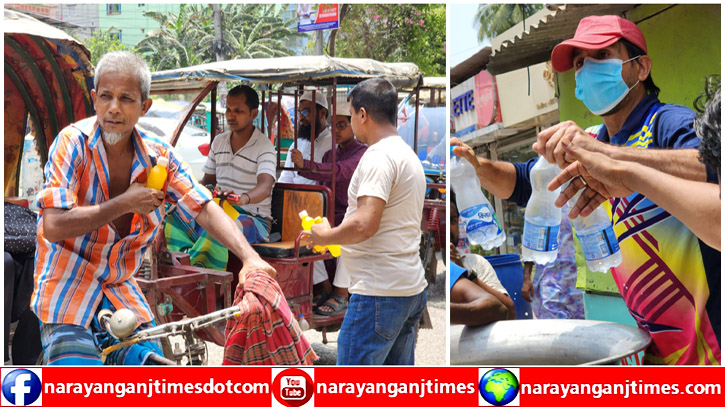 শ্রমজীবী মানুষের পাশে ঠান্ডা পানি ও জুস নিয়ে